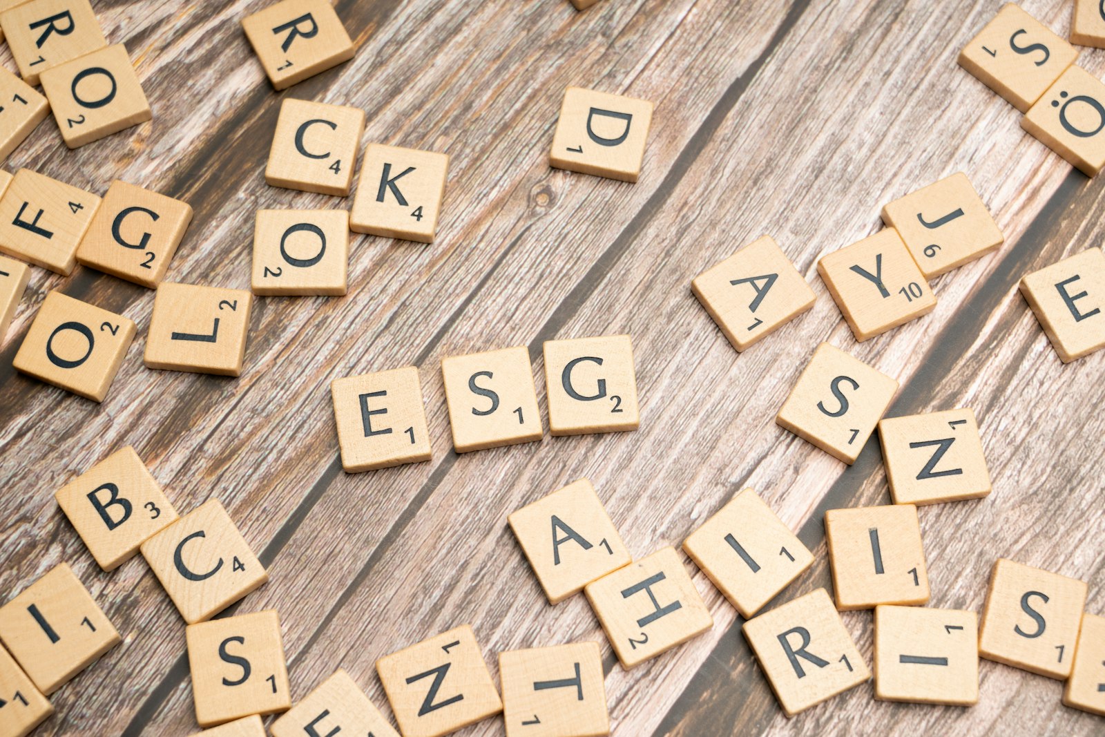 Intelligent Word Generator: Smarter Words, Instantly 1 Wooden letter tiles used to spell words, representing an intelligent word generator tool